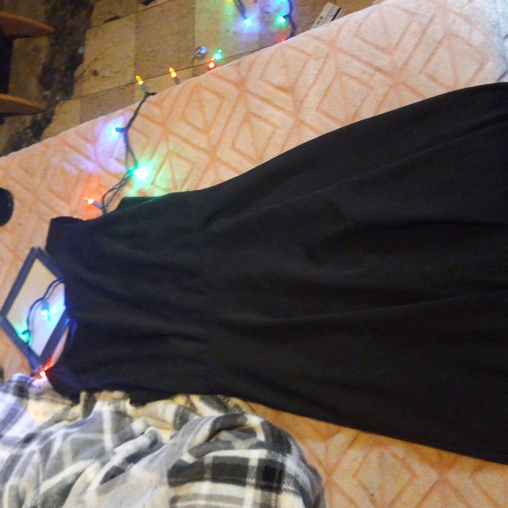 Plain black dress nit dressy at all